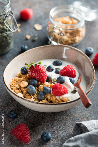 Healthy breakfast, cereal with berries and yogurt