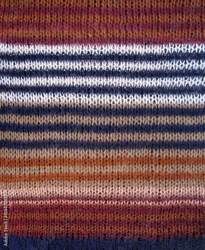 multi-colored knitted stripes pattern, woven fabric textile background