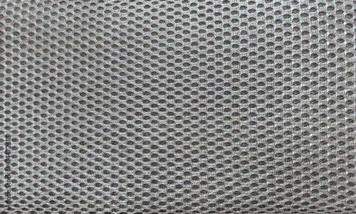 gray mesh fabric textile texture for trainers shoes, clothing, bag photo