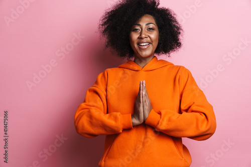 Happy african american woman smiling while meditating © Drobot Dean