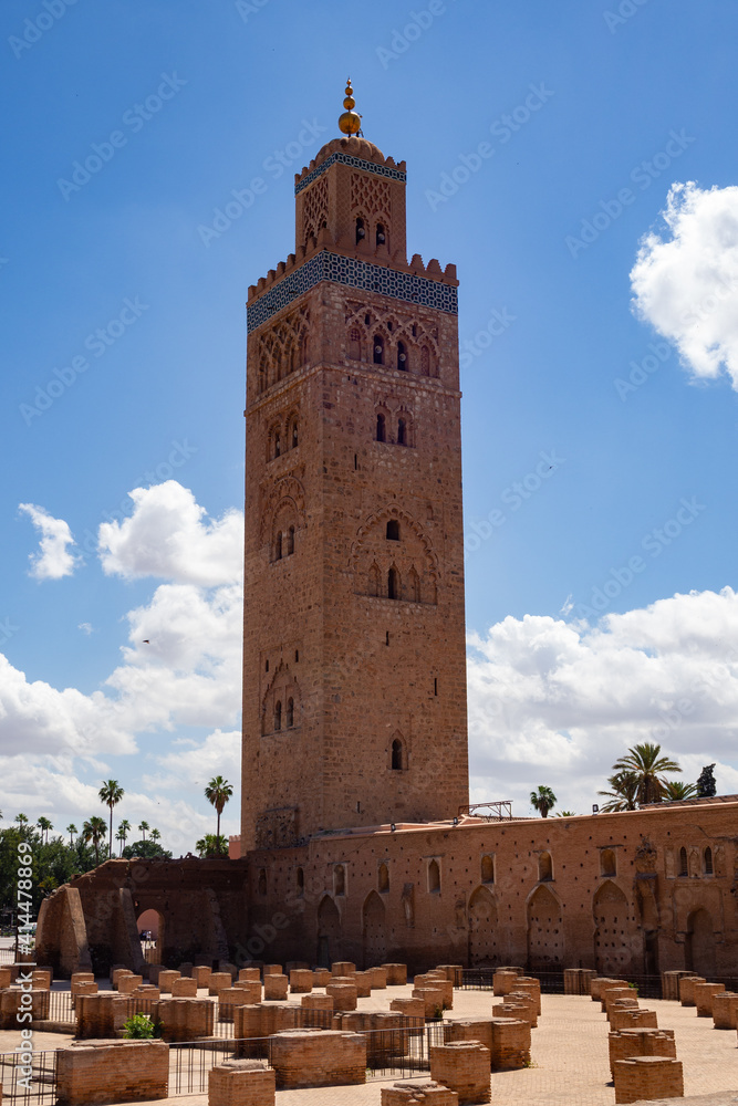 The important minaret of the Koutoubia Mosque with the foundations of the previous mosque in the foreground. Marrakech, Morocco.