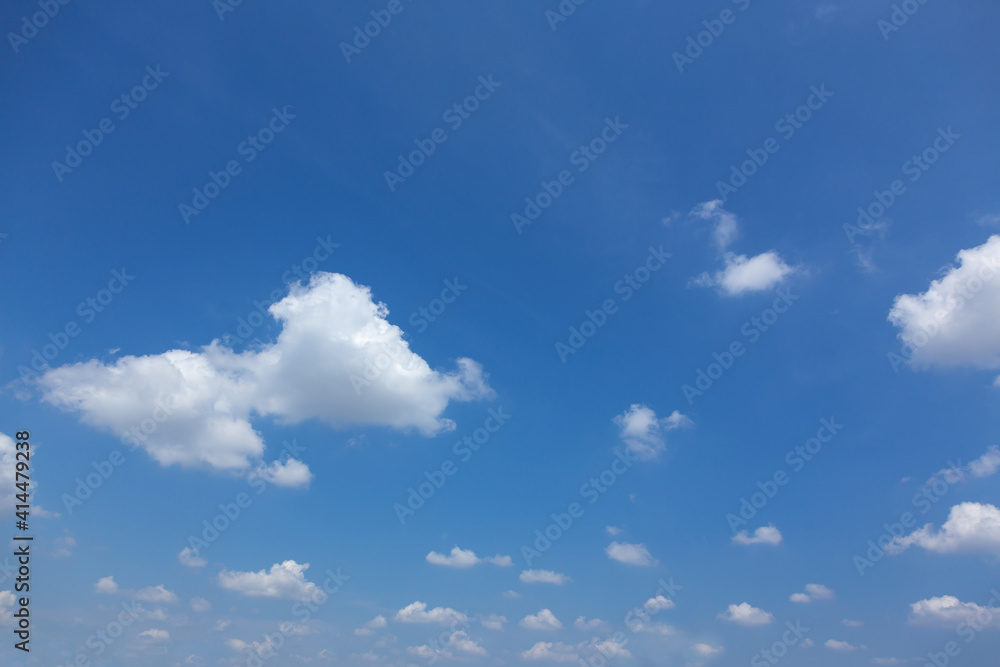 Beautiful light blue sky with cloud for background. the Cumulus cloud with the sun in midday. Beautiful light blue sky with cloud for background. the Cumulus cloud with the sun in midday.