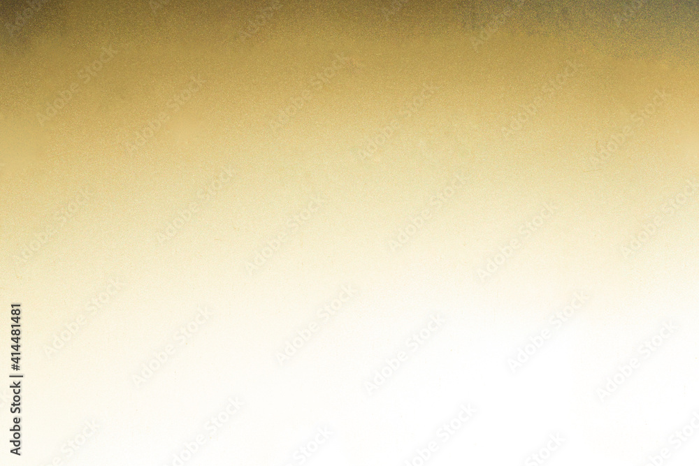 shiny gold striped paper or metal texture. elegant background shiny gold striped paper or metal texture. elegant background