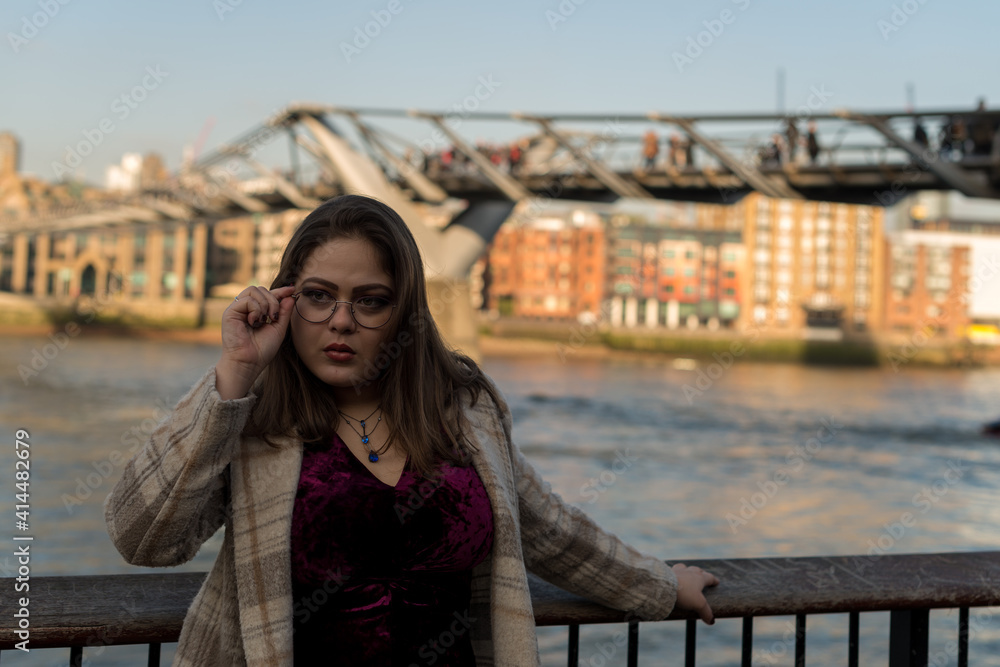 Portrait of Portuguese woman with glasses wearing winter clothes