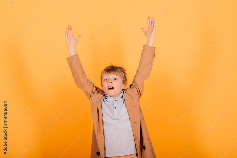 Red hair boy surprise emotions hands on head and wide open mouth Red hair boy surprise emotions hands on head and wide open mouth