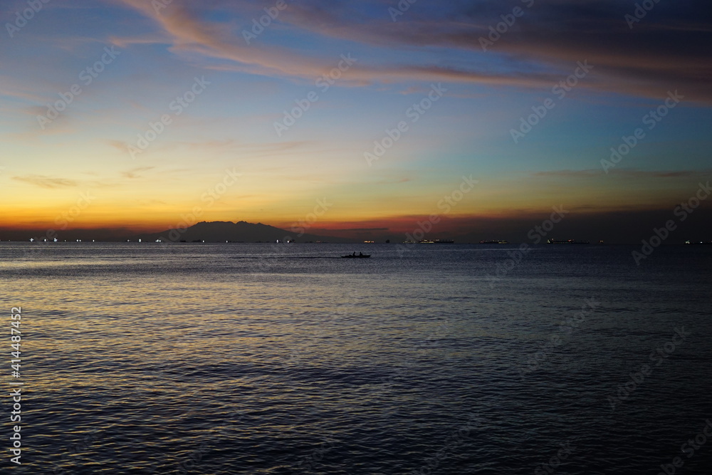 Manila Bay sunset with pink skies