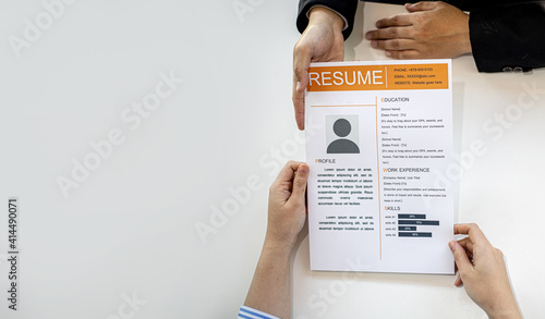 Photos The job applicant is sending a resume to the manager as information for the job interview