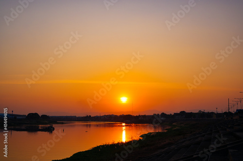 sunset over the river © XOOXO
