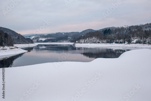 Winter landscape at Soesetalsperre in Harz Mountains National Park, Germany. Moody snow scenery in Germany © Joppi