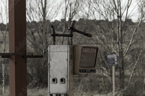 Fototapeta Naklejka Na Ścianę i Meble -  Abandoned gas station near a secondary road