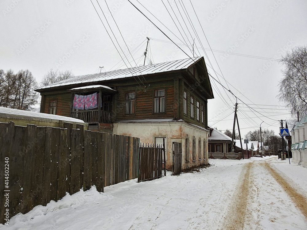 snow covered russian house