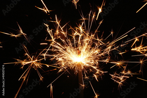 New Year's firework sparkler in the dark