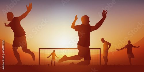 Concept du succès, avec une équipe de football qui exprime sa joie, après avoir marquer le but de la victoire lors d’un match de championnat.