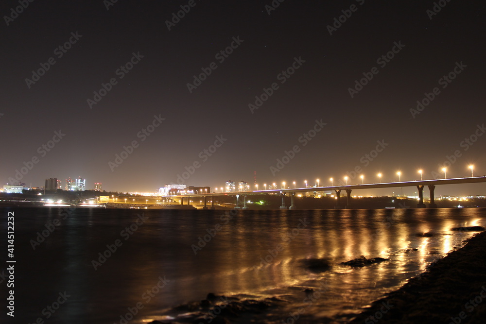 night view of the bridge over the river