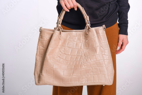 woman holding shopping bags