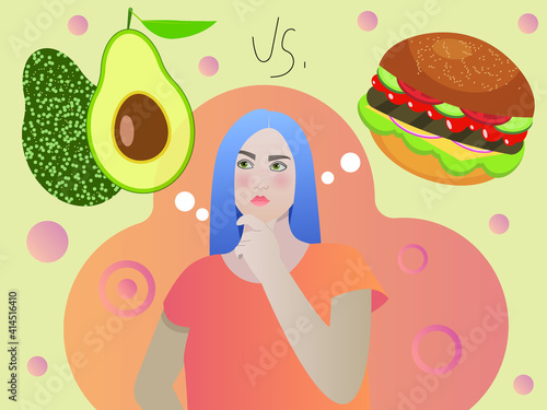 Nice girl chooses between healthy and unhealthy food.  But which will she choose  a ripe avocado or a juicy hamburger  Healthy lifestyle or delicious fast food 