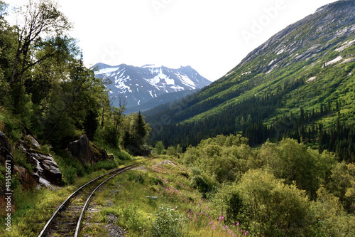 Schilderij op canvas The White Pass historic train tracks passing over mountains from Skagway Alaska
