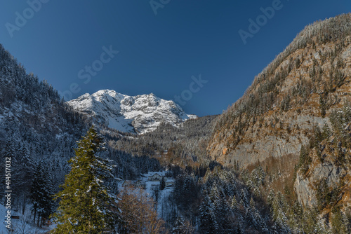Mountains near Hallstatt old town with deep valley in frosty winter day