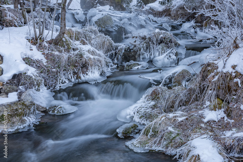 Ramsaubach creek near Ramsau ski town in Austria in frosty morning