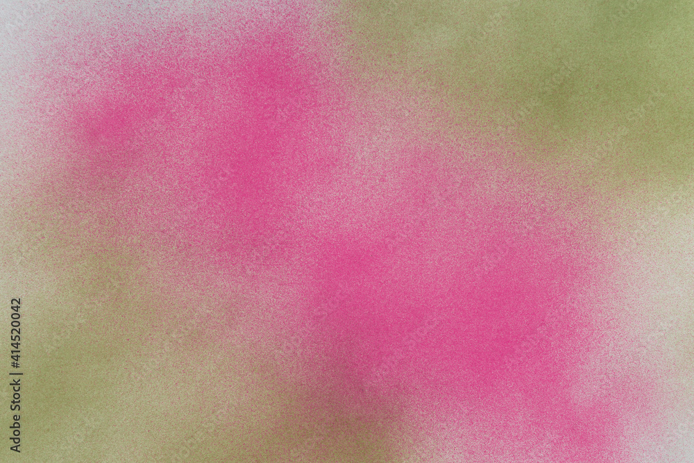 spray paint magenta and green on a white paper background