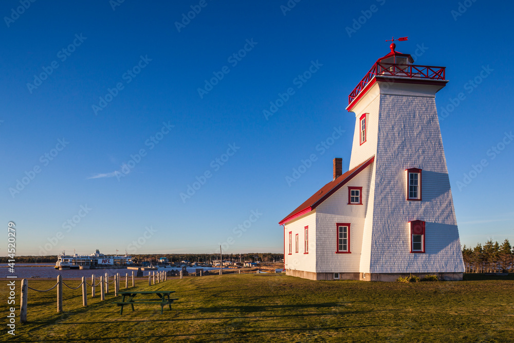 Canada, Prince Edward Island, Wood Islands Lighthouse at sunset.