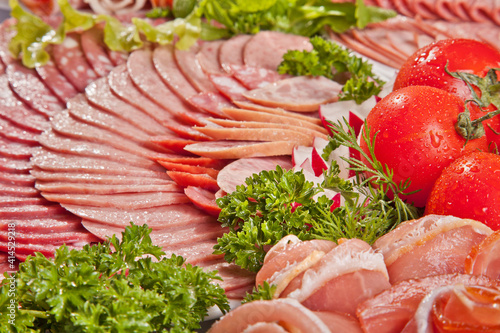 Cutting sausage and cured meat with a parsley