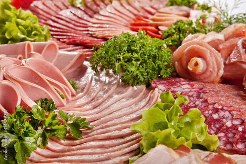 Cutting sausage and cured meat with a parsley