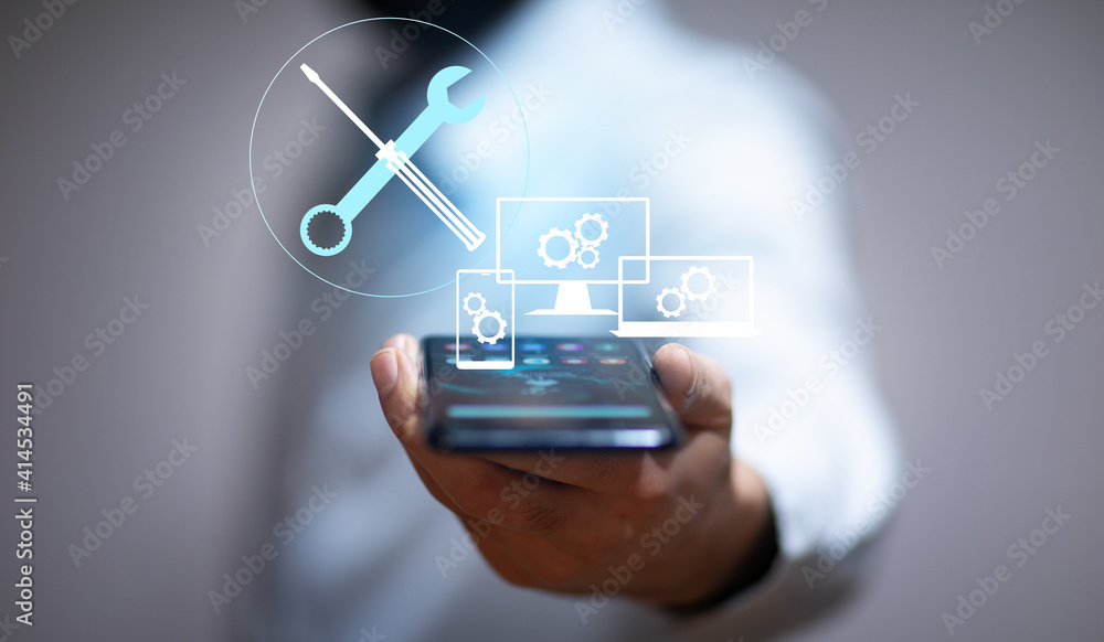 man holding smartphone with Maintenance and repair man holding smartphone with Maintenance and repair