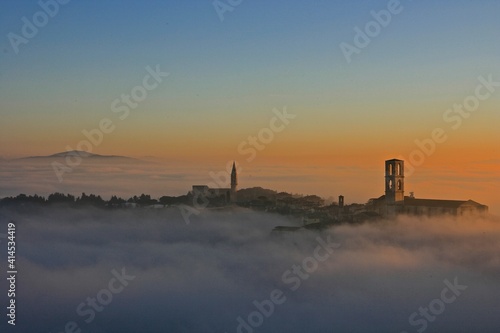 Sunset in the fog, Perugia, Italy 