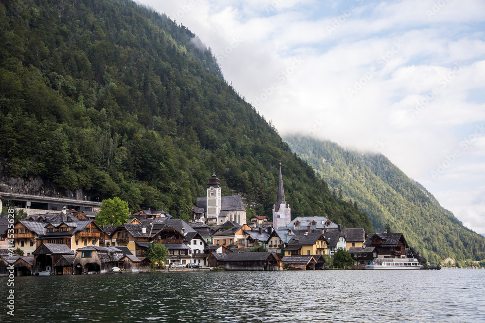 Fototapeta premium Europe, Austria, Hallstatt, Town of Hallstatt as seen from Lake Hallstatt which is part of the Salzkammergut Cultural Landscape, UNESCO World Heritage Site