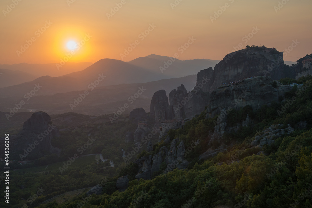 Beautiful view of Meteora Mountains and Monasteries in a summerday at sunset