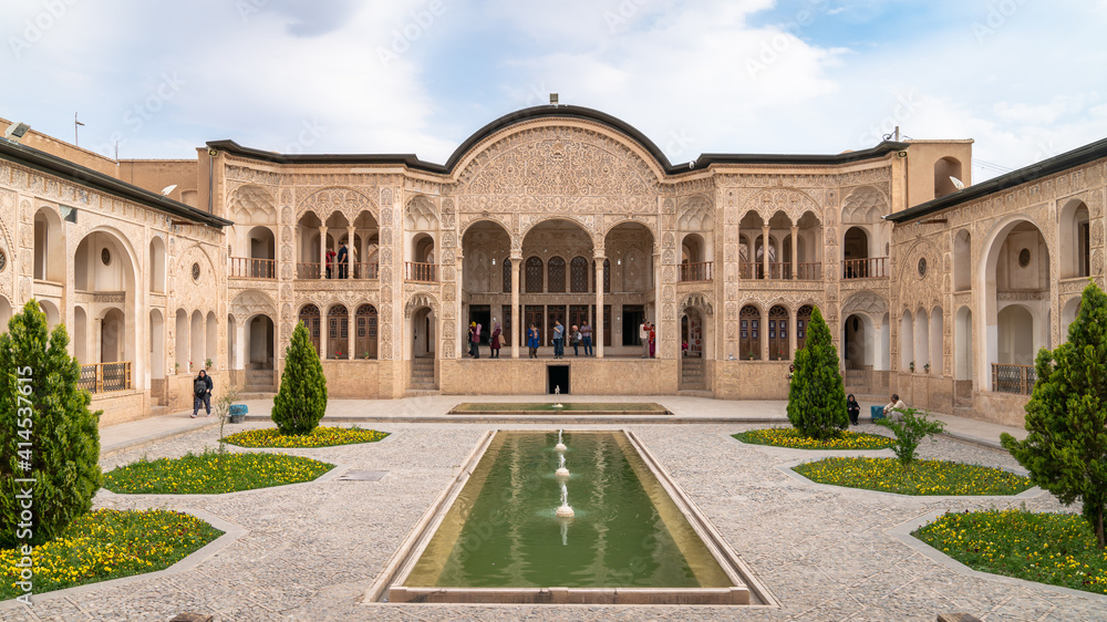 Kashan, Iran - May 2019: Tourists visiting Tabatabaei Natanzi Khaneh Historical House. Wonderful Persian architecture. Kashan is a popular tourist destination of the Middle East.