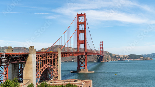 San Francisco, USA - August 2019: Golden Gate Bridge on a sunny summer day. The Golden Gate Bridge is a suspension bridge spanning the Golden Gate. © CanYalicn