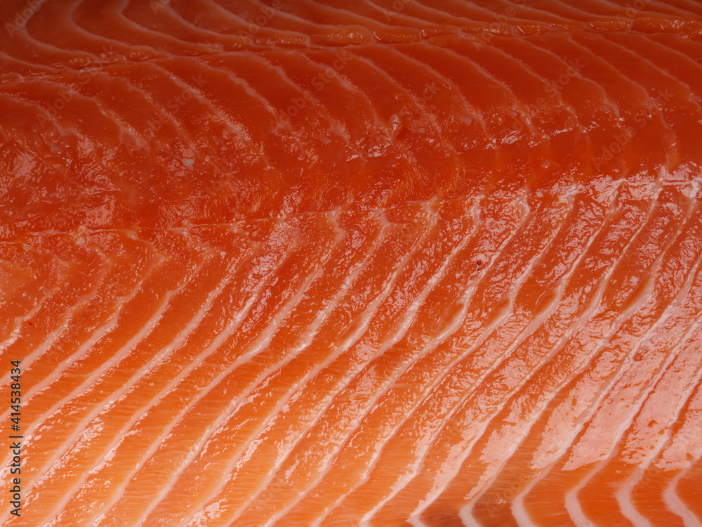 Close-up texture of fresh Norwegian red raw salmon. Top-view. Healthy food concept Close-up texture of fresh Norwegian red raw salmon. Top-view. Healthy food concept