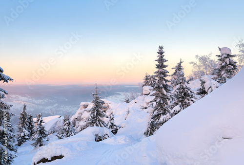 Winter nature landscape in frosty clear evening in the mountains.