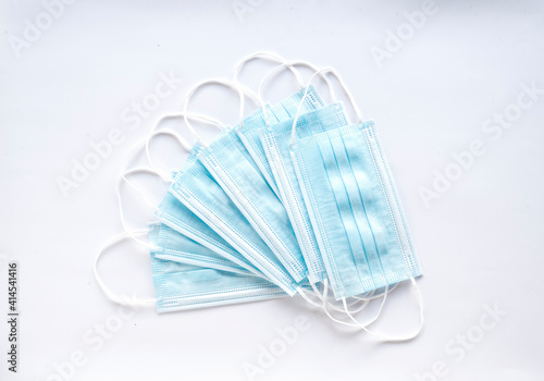 Wallpaper Mural A pile of disposable medical masks to protect the mouth and nose. Coronavirus concept and prevention Torontodigital.ca