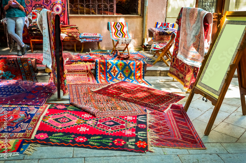 Traditional Georgian Carpets with typical geometrical patterns in the street shop, Tbilisi, Georgia photo