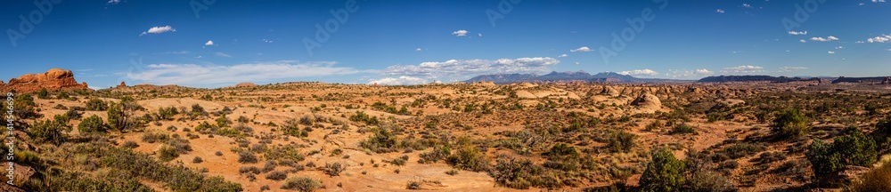 Paorama shot of american desert nature with red sandstone mountains in arches national park in utah, america