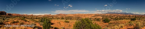 Paorama shot of american desert nature with red sandstone mountains in arches national park in utah, america