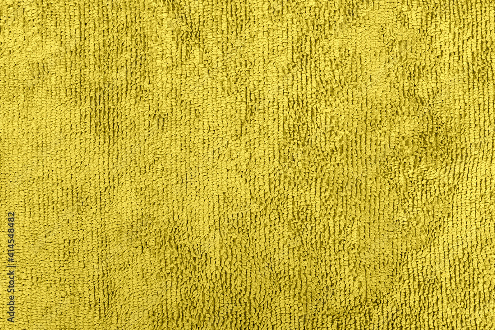 Background made of yellow microfiber fabric Background made of yellow microfiber fabric