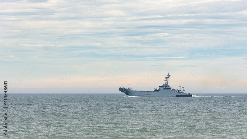 Military ship patrolling sea coast Military ship patrolling sea coast