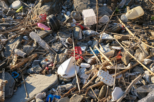 Discarded plastic debris garbage pollution on contaminated ocean sea coast ecosystem,environmental waste 