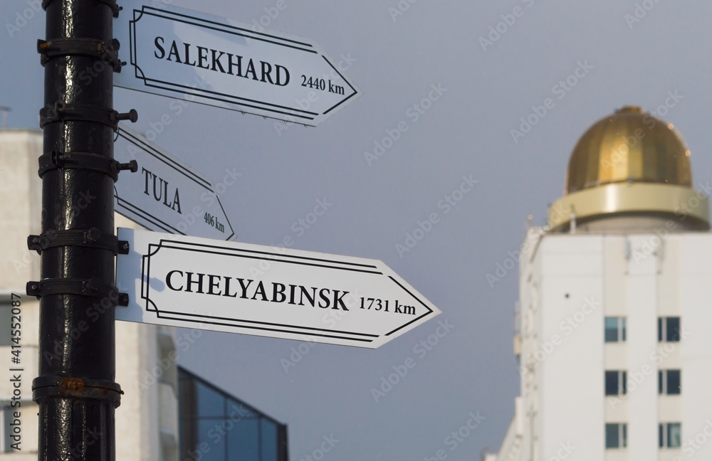 Obraz premium City signpost with white arrows giving directions to Salekhard, Tula and Chelyabinsk (Russia)