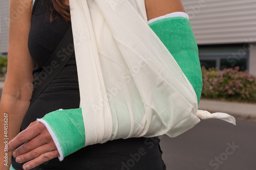 Woman With Broken Arm In A Supporting Loop
