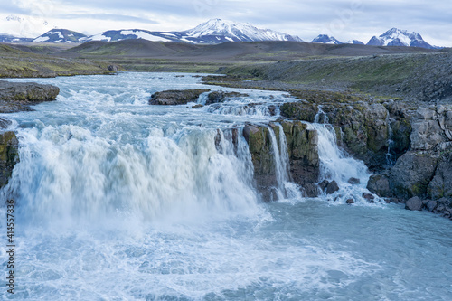 Iceland, Southern Highlands, Gygjarfoss waterfall. This small waterfall flowing through a rather barren landscape.