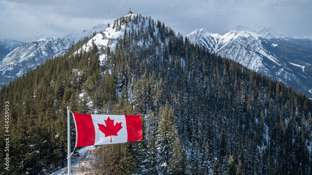 Canada Flag on beautiful landscape 