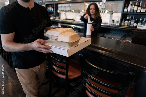 Crisis: Man Picks Up To Go Food During Social Distancing Closure