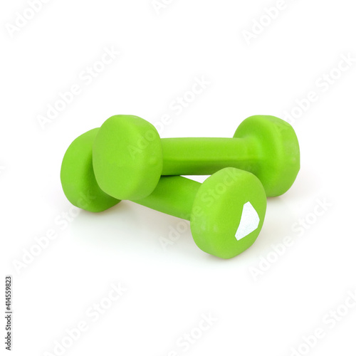Green dumbbells for sports activities isolated on white background