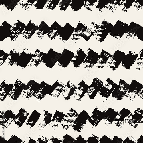 Vector seamless pattern. Abstract background with bold brush strokes. Black hand painted textured print. Monochrome hand made texture. Minimal graphic design. Can be used as swatch for illustrator.