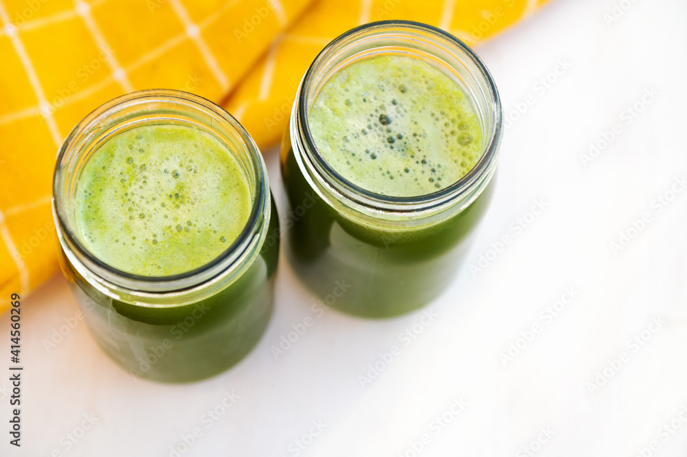 Celery juice. Detox juice. Vegetarianism and healthy eating. Top view. Celery juice. Detox juice. Vegetarianism and healthy eating. Top view.